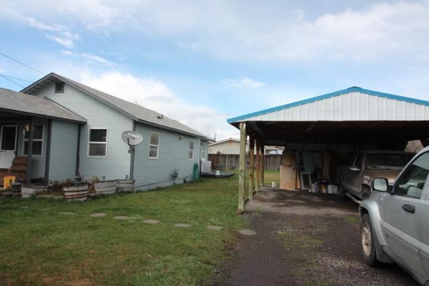 This home is move in ready, everything is pristine. Private master bedroom with own bath. Kitchen has gas cooking stove. 19x24 carport that has lean too on the backside for extra storage, fencing all around for privacy. Storage shed behind the driveway. Two driveways. Room for an RV. Huge hedges in the front of the house that give extra peace and quiet.