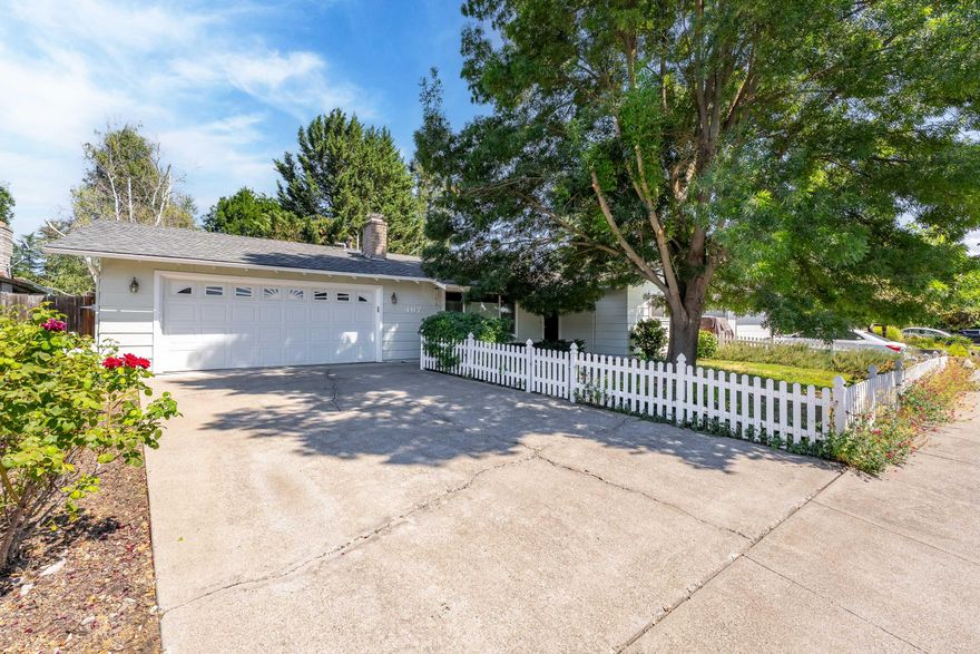 Welcome to this cozy 3-bedroom, 2-bath home nestled in a quiet cul-de-sac just minutes from the hospital and medical services. The kitchen features hardwood flooring and plenty of cabinet space with the dining room accented with hardwood floors and chandelier lighting. The inviting fireplace in the living room is perfect for those chilly days. The sliding glass door leads to a covered patio and a backyard with two raised garden beds—perfect for outdoor enjoyment.

Recent updates include new carpet in the living room, hallway, and bedrooms; new vinyl flooring in the primary bathroom; and fresh interior paint. The home also features a newer central A/C and heating system with an air scrubber, along with all new ducting, boots, and seals. Window coverings in the living room,  bedroom, and sliding glass door provide added privacy.

This home is move-in ready and we invite you to come see it today!