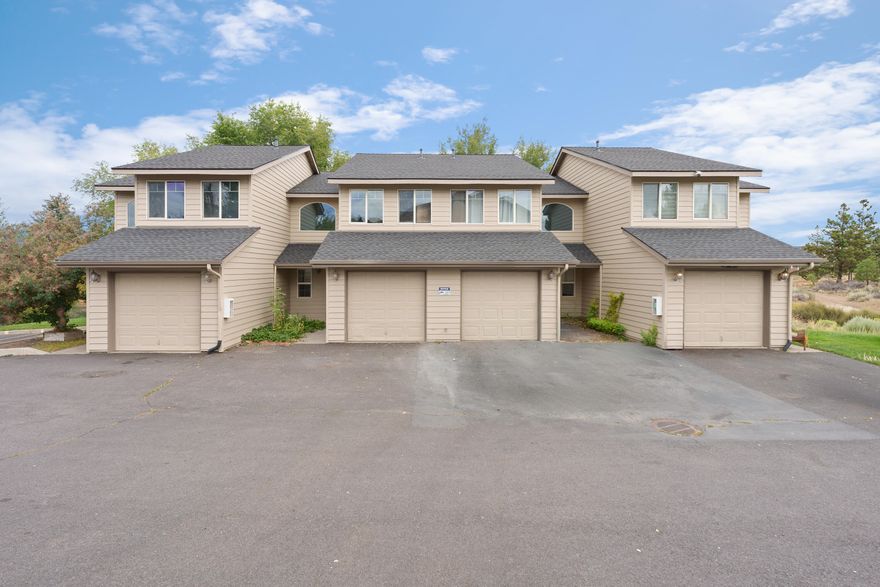 Situated on a quiet, desirable street on Bend's NE side, this mostly leased 4-plex offers great rental income with a newly painted exterior and a new roof. Three units have been upgraded with new carpet, new vinyl plank flooring and new interior paint. Each spacious unit features 3 beds, 2 baths, and 1,060 sq. ft. of living space spread across two levels. Enjoy private rear decks, cozy gas fireplaces, and convenient in-unit washer and dryer hookups. The lower level includes functional kitchens, dining areas, a cozy living room and a full bathroom. Upstairs, you'll find three bedrooms and a full bathroom. The property also includes attached garages and a future park right next door. The property is close to St. Charles, Pilot Butte and numerous additional amenities.