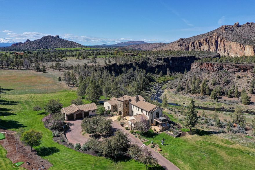 Surround yourself in complete tranquility and luxury on almost 14 acres enveloped by Smith Rock, the Crooked River and the majestic Red Rock Canyon. The
prestigious estate is superior in its phenomenal river views and ultimate privacy. The property has been masterfully refined to become one of the most exquisite
homes in Central Oregon. Boasting a stunning grand entrance and sophisticated finishes with a floorplan that is formal yet creates a comfortable inviting
ambiance. Other luxury amenities include venetian plaster walls, stone accents ,knotty alder trim, hard wood floors and live edge granite. The towering fireplace
makes a commanding statement from the inside and exterior patio. Multiple family rooms, office, hot tub and putting greens by Back Nine Greens. Your own
personal retreat. Also enjoy the outdoor lifestyle the Ranch offers like 1700 acres of meadow, vienyards, river canyon, ponds, hiking/biking trails, clubhouse,
pool and tennis courts, equestrian facility and more