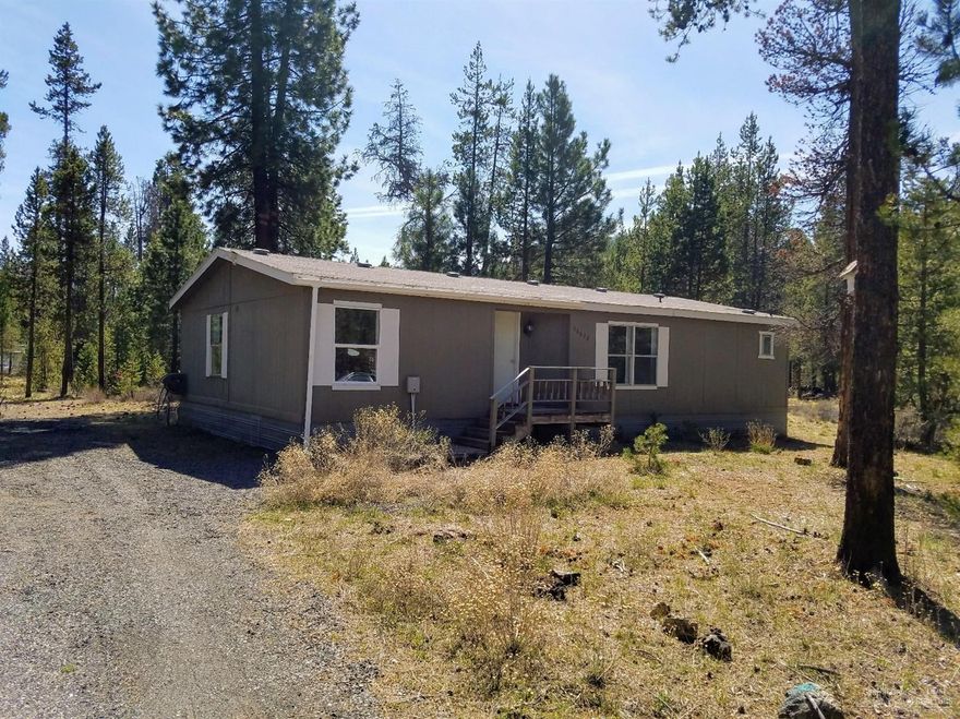So many possibilities, fix and hold, fix and flip, build new. Great location, close to Sunriver, Mt Bachelor, Fish, Ski, Snowmobile, Boat, Camp, Bike, Hike, Hunt, something for all outdoor recreation enthusiasts. This is a .53 acre corner lot across the street from public lands. No need to pay for expensive storage here, 30'x40' Pole Building, room for your large toys, built new in 2009. Purchaser will be offered 1st right of refusal to adjoining tax lot #8300 $60,000 not on MLS yet.