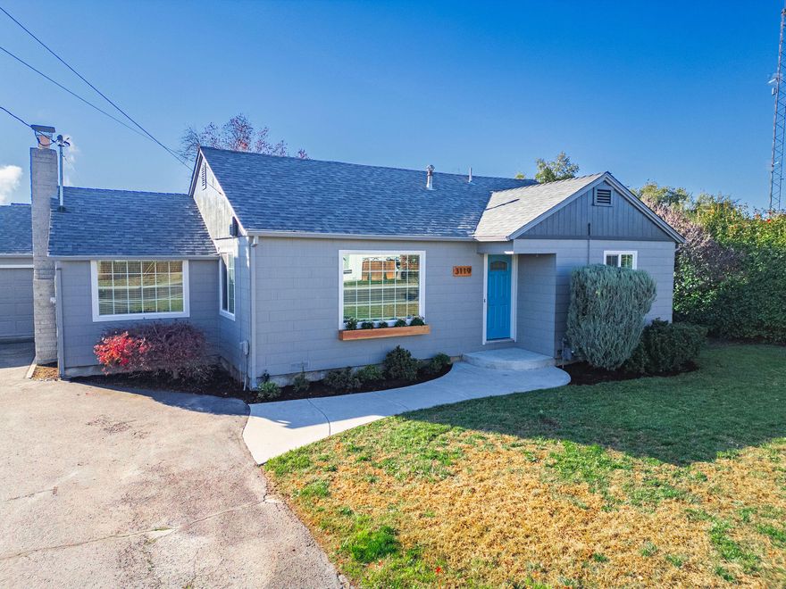 If 'move-in ready' had a perfect example... it's this home. Beautifully updated 1,400 sq. ft. charmer sitting on a spacious corner lot with room for everything. This move-in ready property features 2 bedrooms + a bonus room/office that easily functions as a 3rd bedroom, giving you the flexibility you need. Step inside to fresh interior paint, new flooring, and a bright, inviting layout. The newly remodeled bathroom, stainless steel appliances, and cozy wood-burning fireplace bring both style and comfort. With a newer roof and newer HVAC, the big-ticket items are already taken care of. Outside, take full advantage of the large lot, complete with dual driveway entrances, RV parking, and a fantastic backyard patio perfect for entertaining. The property also includes a 2-car garage that doubles nicely as a workshop, plus sprinklers for easy maintenance. All this just minutes from both Medford and Central Point, offering convenience without sacrificing space or privacy. Schedule your Tour