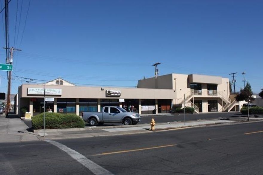 High exposure commercial building with office and retail in downtown Medford. Nice return on Investment, three long term tenants! Main arterial with high traffic count. Well maintained with newer paint, heat and air, newer roof and brand new outdoor LED lighting. Property includes parking lot that was just sealed and striped. 5,000 sq. ft. newly remodeled. 2,500 sq. ft. available for lease, low maintenance -listing broker related to seller.