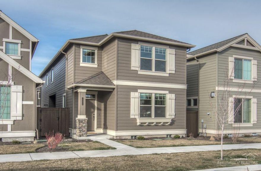 2015 Pahlisch Home Conifer Plan. Stunning home with open floor plan. Kitchen has 2 eating bars, quartz counter tops and stainless steel appliances. Great room with gas fireplace and the whole main floor has laminate wood floors. All bedrooms are upstairs. There is an open loft area perfect for office, media room or play room. Alley entrance 2 car garage. Boyd Park is in the neighborhood. HOA maintains front yard. This home has side yards on both sides of the home.
