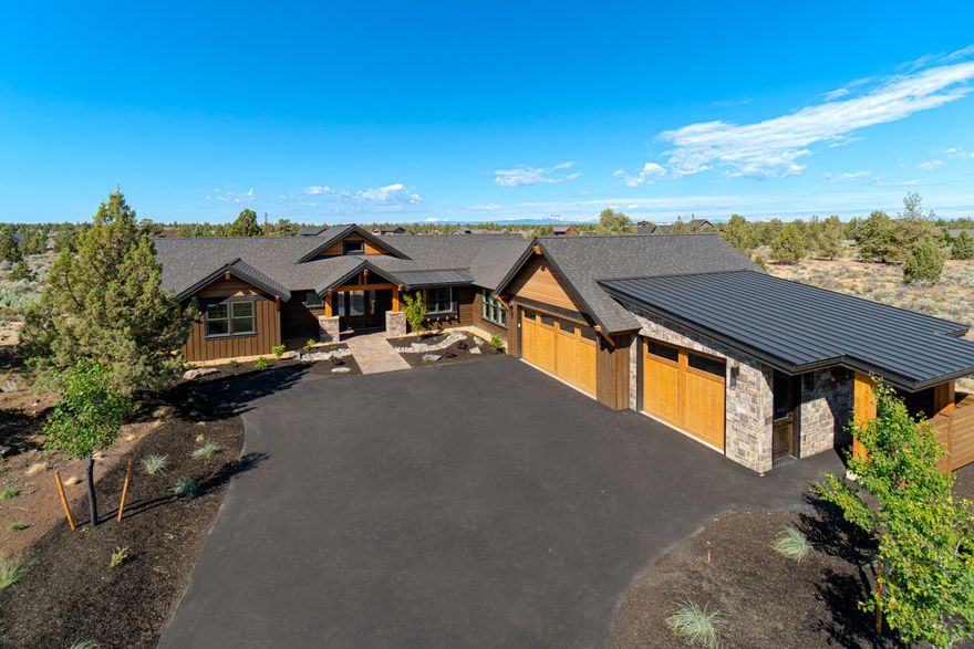 Enjoy living in beautiful Powell Butte, nestled in the natural sage & bunchgrass in the heart of Central Oregon. This custom home offers rustic elegance throughout w/a grand covered entry opening to a Vaulted Great Room. Main living area ftrs rustic stone surround gas burning fireplace w/mantle. Spacious entertaining area w/coffee bar/buffet area, Gourmet kitchen & Dining space to accommodate your guests. Lg central working island, JennAir Gas cooktop w/hood, large SS refrigerator & main sink has an incredible outside view. Owner Suite separation ftrs Vaulted ceiling + slider door to back patio, bath ftrs dbl vanities, curbless tiled shower, walk in closet & builtins! A spacious office/den/workout studio is across the way w/2 junior suites w/private Baths. Oversized laundry room w/cabinetry & sink. Step outside & cozy up to the gas firepit or watch the snow fall while you bbq. As a Brasada home owner, you'll have access to an abundance of amenities for year round enjoyment.