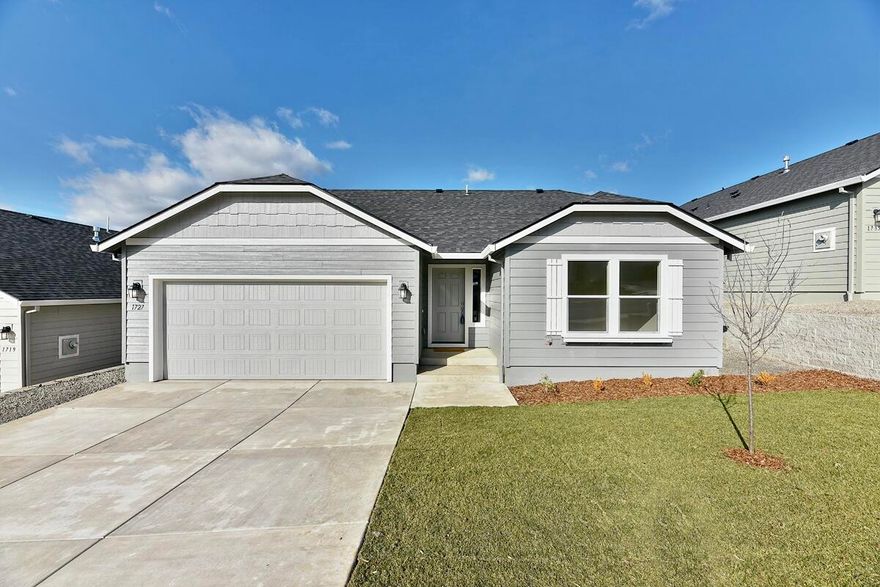 Move in Ready! NEW PRICE! WAS: $449,990 NOW: $429,990. New Season, Big Savings! Get up to $25,000*. Contact us to learn more! The 1408 square foot Edgewood is a mid-sized home catering to those who value both comfort and efficiency in a single level home. An award-winning designed kitchen, featuring a breakfast bar and ample counter space, overlooks both the spacious living and dining rooms. The separate main suite affords you privacy and features two large closets in addition to a dual vanity ensuite. The two sizable bedrooms - one of which may be used as an optional den - share a full bathroom and complete this design-smart home plan. *Pictures are of a similar home.