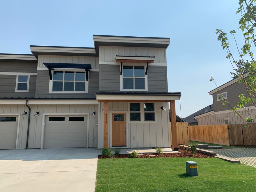 Welcome to this gorgeous new townhome at the Village at Ridgeview!  Only 5 homes left! Upscale interior finishes include stainless steel appliances, iced white quartz countertops Paradigm Performer floors, nickel finishes, and a gas fireplace.  The heart of the home kitchen features snow white mantra cupboards, a downdraft range, dishwasher and microwave.   Plenty of space for all your hobbies in this 3 main bed/2.5 bath home and the vaulted ceilings on both floors make it feel even roomier.  The laundry is conveniently located and the home has A/C.  The extra long garage has room for storage or a workbench.  The fenced yard to  and south facing back patio are perfect for pets and  BBQs with your friends and family.  Ideally located in a beautiful new neighborhood near Ridgeview HS, you are only 20 minutes to Bend. Open Houses often or call for an appointment, the homes are under construction.   Visit soon!