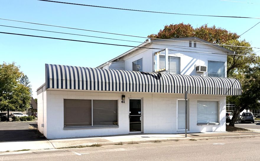 WOW, check this out, Seller is willing to owner carry for 5 years with only $50k down!! This 1,240 sq ft office space, formerly a successful tax office for years, offers great visibility and flexibility for your business needs. Plenty of parking available for clients and staff. Upstairs, a private entrance leads to a spacious 2 bed, 1 bath apartment (approx. 900 sq ft) with a full kitchen and living room, ideal for live/work or rental income. Multiple options available for configuring the space to suit your goals. Don't miss this unique opportunity!!