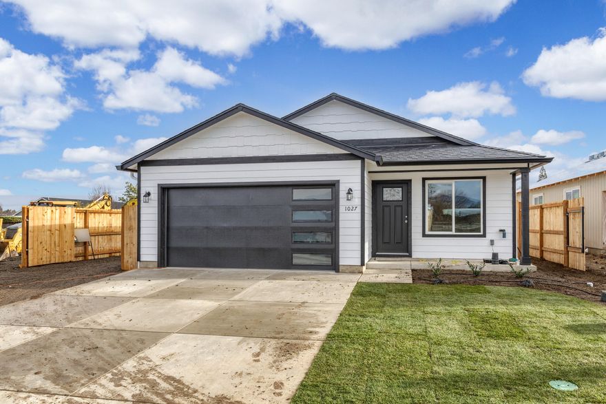 New construction, completed, and ready for you! This is a 3 bedroom, 2 bath home has vaulted ceilings and a spacious feel when you walk through the door. Home features include: Granite counters, laminate flooring, beautiful farmhouse sink, white cabinets, RV parking, a fully fenced yard, and landscaping front and back. It is set in southwest Medford, close to shops and other amenities. This home is ready for you to build memories. The address does not map correctly yet. Use ''Aster St, Medford'' to get proper directions. Agent is related to seller/builder.