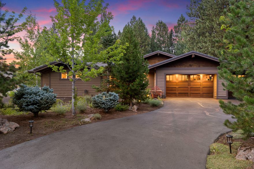 Welcoming courtyard & water feature beckon you into this meticulously maintained single level home located in Broken Top. Great room concept w/large picture windows & built-in media cabinet w/gas fireplace. Open kitchen w/built-in breakfast nook, massive breakfast bar/island ideal for entertaining & meal prep. Other features include slab granite counter tops, hardwood floors, Sapele wood cabinets w/soft close drawers & full house hot water re-circulation system. Private Primary Suite with separate heating zone & heated bathroom floors. Two additional bedroom suites in separate wing offers ideal separation.  The den/bonus room with doors is the perfect spot for kids, exercise studio or home office. Relax and entertain with your choice of two patio spaces, one off the kitchen area, the other off the great room. This home also boasts Hunter Douglas Duette top-down/bottom-up blinds, Chamberlain garage door opener, Honeywell thermostats and Orbit irrigation controller are internet-enabled.