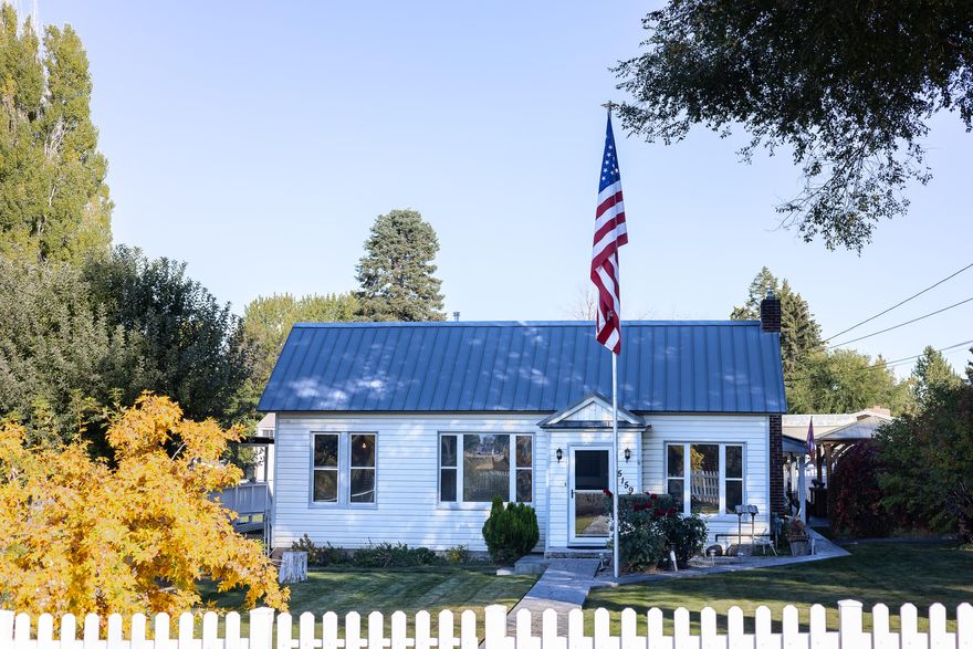 Discover this unique property featuring a beautiful 1,728 sq ft home plus an ADU, perfect for multi-generational living or rental income. Large .67 acre lot with KID irrigation to maintain the expansive garden, mature trees and lush greenery. The main home features 3 bedrooms, 2 full baths. Lovely updated, functional kitchen. Tons of built ins, plus storage rooms and a bonus room/office. Primary has a walk in closet and remodeled bathroom. The ADU is a 3 bedroom, 2 bathroom manufactured home which is 1,100 sq ft. Both homes have been meticulously maintained. Both homes have fully fenced yards, providing privacy and security, plus a shared dog run. Three large sheds for all your gardening tools and outdoor equipment, or to use as workshop space. Enjoy worry free living as both homes have metal roofs, the main home with solar system as well! Book your private showing today!