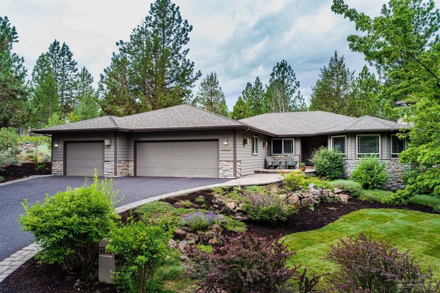 Attractive single level home in the gated, golf course neighborhood of Awbrey Glen. Built by Schumacher Homes, the home features a well designed floor plan, gas fireplace in the living room, hardwood and tile floors, granite counters, a kitchen island/bar, built-in desk in the family room and art shelving in the dining area. A paver patio wraps across the rear of the home, and overlooks the lawn and natural landscaping. The patio is accessed from the family room and master suite, with the hot tub conveniently located by the latter. The garage provides room for up to 4 cars, has a work bench and lots of room for a drift boat, or a golf cart. The corner lot is peaceful and private, but also close to the neighborhood park, tennis courts, and lake. With the golf membership, the other amenities include the golf course, clubhouse, athletic center and pool. Not far from schools, the Deschutes River trail, and downtown Bend. A great home in a superb location!