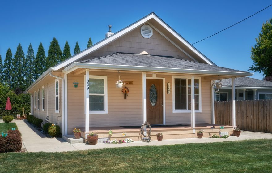 See this adorable remodeled cottage located in the heart of Central Point. This home is within a distance of local shopping centers and several restaurants. You will see that the home sits back off the property and provides a great front porch for relaxing or guests. Walking into the home you will find a living room with a dining room that flows into a good-sized kitchen. Two of the three bedrooms are at the front of the home with a full-sized bathroom. Continuing past the kitchen you will find the 3rd bathroom and another full-sized bathroom. The laundry room is located right before the backdoor which leads you to the perfect courtyard that comes with a gazebo for shade. Around the corner of the back of the property, the detached garage which has a finished studio above is the perfect location for a home office. Since the seller liked being outside in the garage and spending time outside they decided to add a half bath that is connected to the house. This is a great feature!!