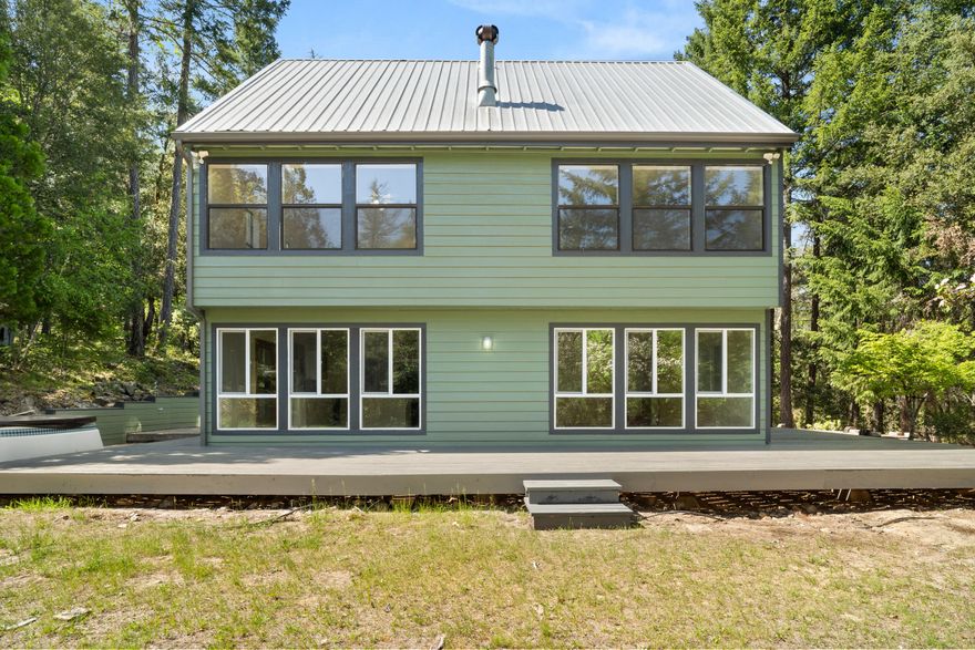 Beautiful home on 11+ wooded acres. If you are looking for privacy this is for you. The home features cutting board counter tops, a wolf range, a stainless steel oven, a large detached 2 car garage, new siding, paint inside and out, new flooring, new septic system and much more. This is a Fannie Mae HomePath property.