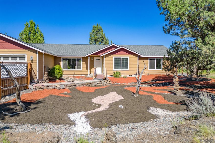 Welcome to 6306 SW Ermine, Terrebonne - a secluded sanctuary set on a pristine 5-acre lot. This unique property offers an unparalleled blend of privacy, comfort, and historical charm. The home features a spacious open floorplan with custom primary suites thoughtfully placed on opposite ends, ensuring ultimate privacy and comfort for residents and guests alike. The beautifully landscaped grounds are a highlight, featuring a custom fire pit with ample seating - perfect for enjoying serene evening under the stars. Adding to the property's charm is an old rock shelter, a testament to the craftsmanship of the old ranch hands who built it, offering a glimpse into the area's rich history. Experience the perfect balance of modern living and rusting elegance at 6306 SW Ermine. This is not just a home; it's a lifestyle. Don't miss the opportunity to make this unique property your own.