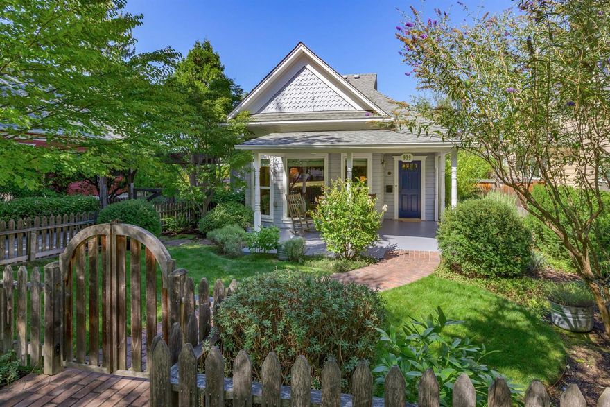 Beautifully renovated and maintained cottage in ideal RR District location. This lovely home is one people see and think, That is the Ashland dream. Tastefully renovated in 2008 and enhanced over the years make this home move-in ready. The main house consists of 1221 sf and has an inviting front porch. The living room has large windows, allowing for an abundance of natural light. The bright kitchen has stainless steel appliances, custom cabinets and tile backsplash. The large master bedroom has space for a reading chair or writing desk and is a relaxing place to unwind. Out back sits a 704 sf separate studio space with its own bedroom and bathroom. This is the perfect guest area, art studio or home office. The grounds of this property were all professionally designed, making it an outdoor oasis. All of this in the most desired location in Ashland- short jaunt to downtown, easy access to the bike path and a flat neighborhood to explore and to get to know your neighbors.