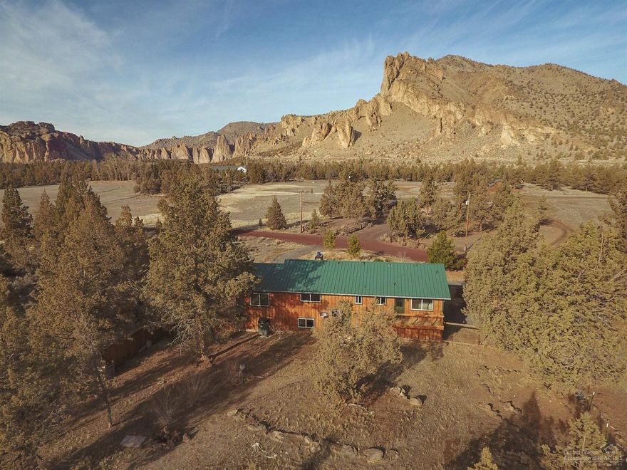 Stunning Smith Rock Views,Sunsets and wildlife from this freshly remodeled home. Carefully renovated 1300 sq ft barn/shop ready for your needs. Water rights for two fenced pastures. Newly drilled 30 GPM well and recent Septic updates. Enjoy quiet country life or use for Huge Investment opportunity with Air BNB potential.