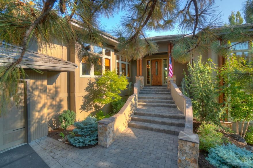 Price Reduced! Motivated Sellers! This entertainer's dream home features stunning custom craftsmanship, nestled against the 17th green at Broken Top. Light permeates an open floorplan w/ near floor to ceiling windows facing course, while soaring 11.5 foot ceilings provide a lofty feel. Enjoy main level living w/ greatroom, gourmet kitchen, dining area, master suite, 2 guest suites, den/office & mud room all on main level. Downstairs is an ample bonus room w/ separate entry & a 4th guest suite. Master has true, separate his & her bathrooms & walk-in closets, spa-like large tile showers, free standing soaking tub & radiant heated floors. Added home features include high efficiency heating & cooling & a large entertainment size patio w/ views of the green. Plus, an over-sized triple-car garage with a large bonus storage room has the potential for a wine room, shop or hobby room. An impeccably landscaped yard & meticulously maintained home has been lightly lived in as a 2nd home.