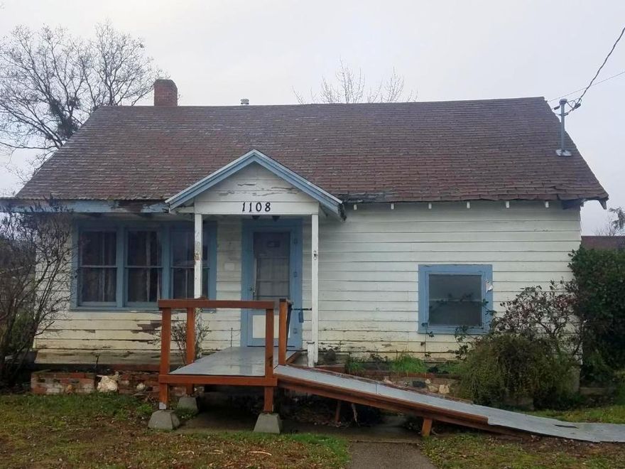 2bd/1ba cottage on large.35 acre lot. In need of tender loving care but lots of charming features and rustic charm including wood floors and knotty pine ceiling. Large eat in kitchen with plenty of storage. Detached two car garage with finished hobby room and additional storage. Lots of parking.