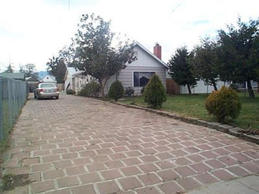 2 homes! Front unit 3 bed, 1 bath,968 sq. ft., fireplace-investigate prior to use. New vinyl, new w&d hookups, new light fixtures. Built-in microwave. All bedrooms have new electric Wall heaters. Bathroom remodeled. New electrical service & breaker panel. Rented for $750. Back house is a garage conversion with no permits. 1 bed, 1 bath, new wall heaters, new walls/insulation, new kitchen cabinets. A/C in wall. Newer carpet, new back fence. Tenant occupied-rents for $375. 1 electrical meter for both. Seller to do 1031 exchange.