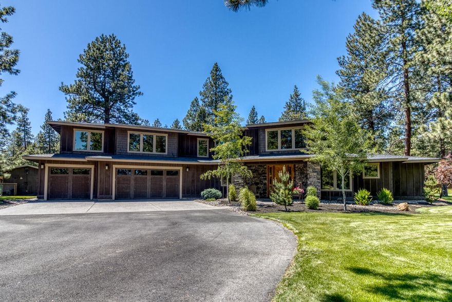 This is a must-see custom home set on a flat 1.97 acre lot with fully irrigated landscape and expansive lawn. Relax while listening to the birds and watching the deer! Impressive main floor primary bedroom with large walk through closet and oversized walk-in shower. Den/spare bedroom downstairs. Upstairs features two en-suite bedrooms with walk-in closets. Large bonus/movie room over garage. Dual heat pumps, central vacuum, beautiful wood burning fireplace. Two covered patios for comfortable outdoor enjoyment year-round. Oversized 40' X 90' shop with flex space that can be used for office/rec room. Shop has large loft upstairs for storage and a bonus area. Plenty of covered parking for all of your toys! Extra storage areas in home and in shop. Beautiful park like setting that is private, quiet and close to town. Just blocks from Brookswood Meadow Plaza and minutes from the Old Mill District. Property owner is licensed Realtor in Oregon.