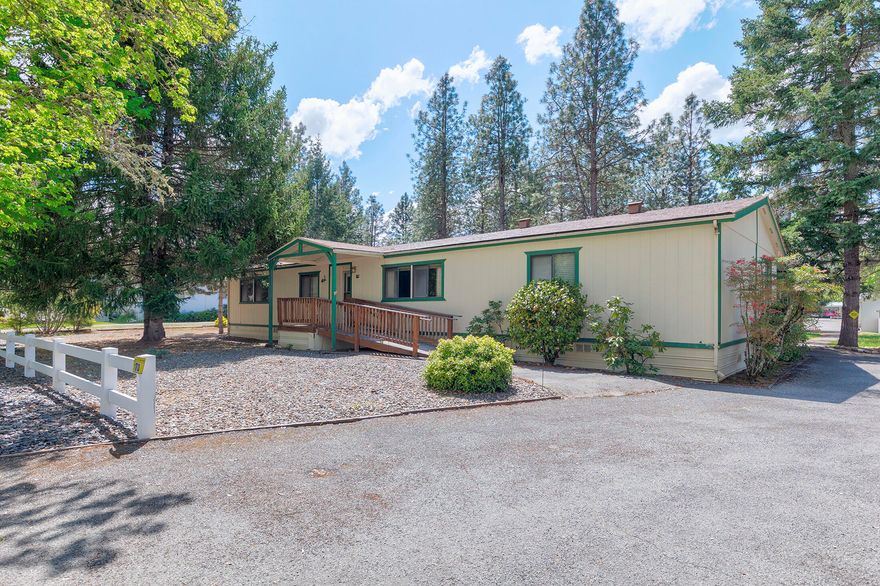 Located in North Valley Mobile Home Estates and sitting on .24 of an acre this 1984 Manufactured home features 3 bedrooms, 2 bedrooms, approx. 1848 sqft., large living room with vaulted ceiling &  certified woodstove, dining room, kitchen, laundry room, new floors in 2009 and new heat pump in 2014.  Large primary bedroom and primary bathroom w/separate tub & shower, double sinks.  Main bathroom with tub/shower combo.  Large screened in porch out back leading to carport.  Shed out back is 8 x 10.  All appliances included!  HOA fee $125/quarter, includes septic pumping, water and maintenance of common areas.