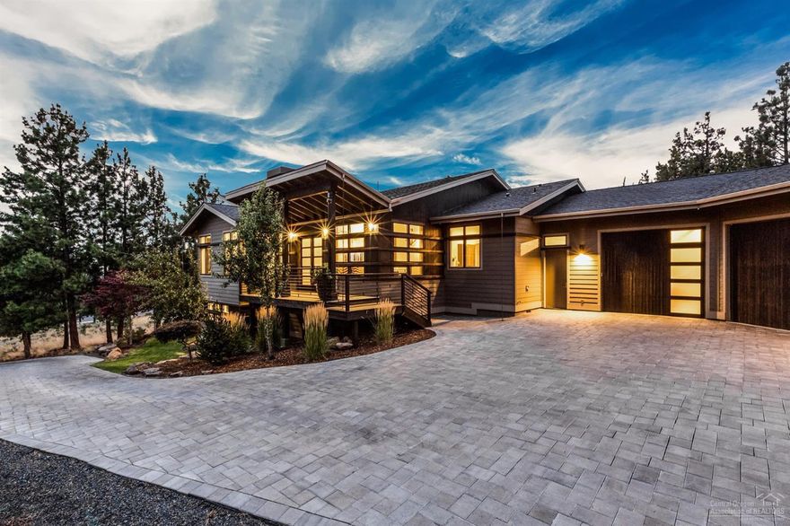 This stunning property is definitely a must see! Contemporary, modern style with lots of natural light makes this home really stand out. Touches of European excellence and design, an open floor plan, clean finishes and a very inviting covered deck make this a gem for entertaining friends and family. Complete with a chefs dream kitchen, a toy lover's garage w 10' doors, a large wine cellar, and just the right amount of privacy, this home is the definition of elegance and class.