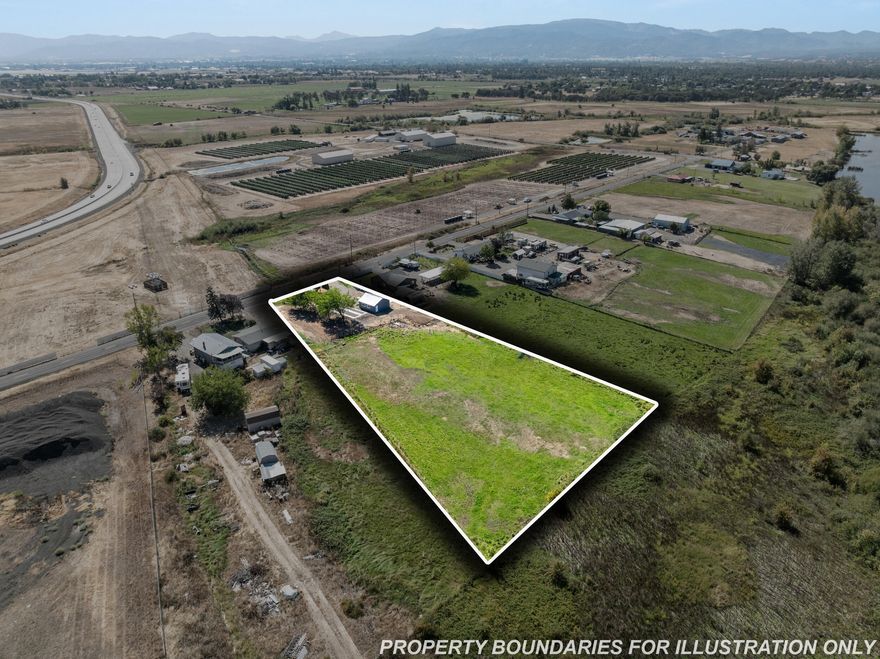 OWNER CARRY TERMS PREFFERED! This centrally located 1.6 acre lot features a 24x24 garage, well, city sewer, power, and irrigation! Nice building lot ready for your home. Manufactured homes allowed!