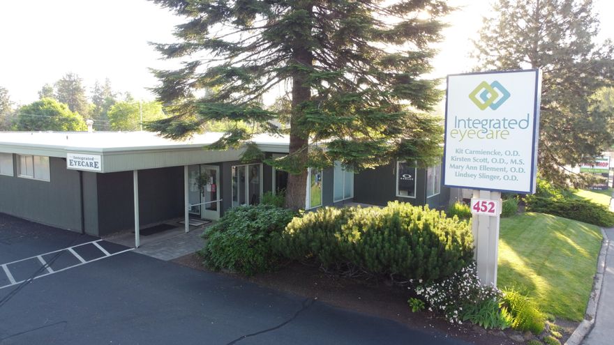 3,773 +/-SF on the first floor and 700 +/-SF of basement office/storage space in NE Bend. Excellent condition and ready for a new Owner/User. Zoned CL - Commercial Limited.

-0.32 acre lot
-Vestibule with large entry
-Retail eye dispensary/waiting room
-7 offices/exam rooms on main floor
-2 offices downstairs with file storage
-1 breakroom
-2 sinks in the breakroom & 1 in the lab area
-4 bathrooms
-Physician assistant area
-Three (3) grade level HVAC units with air scrubbers (added in 2020)
-27 parking spots (13 on property & 14 shared w/City of Bend on separate tax lot)
-Current tenant's lease runs through December 2021, they wish to remain in the building through April 2022

Located in the heart of Bend off NE Greenwood. This property is in both the Enterprise Zone and the Opportunity Zone. The Enterprise Zone provides multiple tax incentives limiting personal taxes on equipment, incentives with Energy Trust of Oregon, and additional programs.