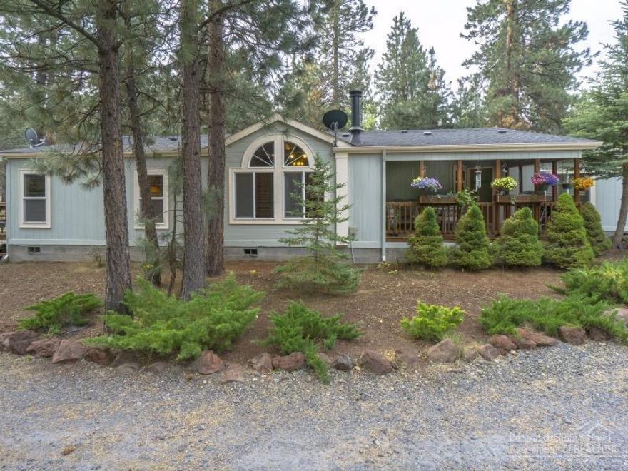 Beautiful single level home on flat 1.07 acres. Horse property with 2 stall barn and paddock, ride from the property onto open forest land, XLG shop with RV space, swimming pool, hot tub, green house, log storage house or play house. Triple wide manufactured home beautifully maintained and landscaped, private and fenced. Community park just a few steps away. Hike, Bike or Ride for miles! Enjoy the best of Central OR life right out your front door!