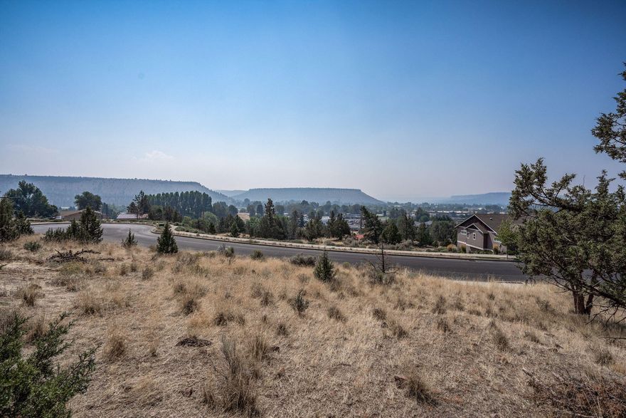 Welcome to this fantastic property in the sought-after IronHorse community! This property offers killer views and is ready for you to build your dream home. Located on a quiet cul-de-sac, this lot boasts all utilities stubbed to the lot, ensuring a hassle-free experience. Imagine waking up every morning to breathtaking views of the surrounding landscape. With the Barnes Butte walking or hiking trail complex just a stone's throw away, outdoor enthusiasts will find endless opportunities to explore and stay active. Whether you enjoy peaceful walks or thrilling adventures, this neighborhood has to offer. The location of this property offers the ideal balance between privacy and convenience, ensuring you're never too far away from the amenities you need. Don't miss out on this incredible opportunity to create the life you've always dreamed of. This property is a blank canvas, ready for you to turn your vision into reality.