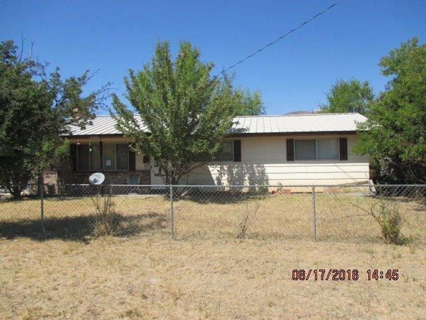 Grab your gloves and get ready for some work. This home has great potential if you can see past the items left behind. Please note that the mail box that is in front of the house actually belongs to the neighbor, so please do not remove any mail.