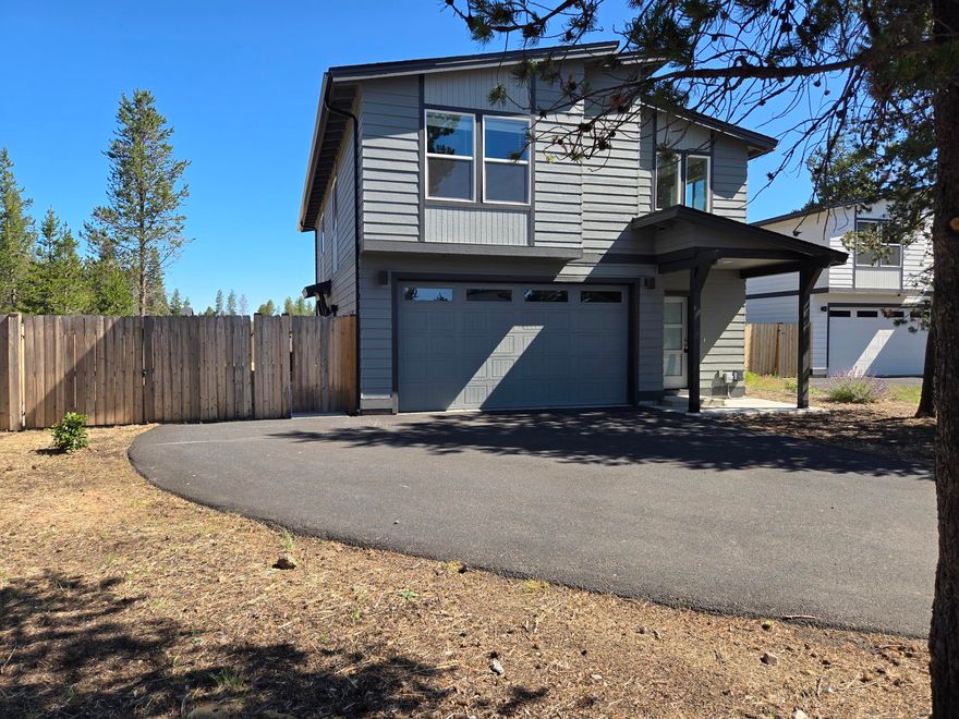 This 2022-built home in the Peaceful Pines subdivision features a main level of approximately 1,741 sq ft and a 609 sq ft attached ADU, totaling approx 2,350 sq ft. The property offers 4 bedrooms and 3 1/2  bathrooms across its layout, situated on a 0.21-acre lot. Enjoy the convenience of a modern design with an attached accessory dwelling unit. The home includes a spacious open floor plan, ample natural light, and outdoor space. Additional highlights include a two-car garage and a well-maintained exterior. Schedule a showing to explore this property!