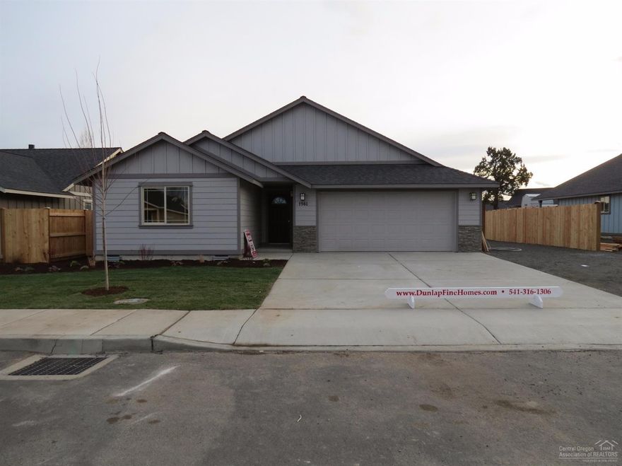 New construction in NW Redmonds Crane Meadow. 3 bedroom, 2 bath home with 1,768 sq.ft. Large Great Room with gas fireplace opens to Dining and Kitchen with eating bar. Knotty Alder cabinets with quartz slab counter tops, all stainless appliances. 30 year roof, forced air gas that is AC Ready. Separate utility room. Double car attached garage. Landscaped front with sprinklers. Single level home with great curb appeal.