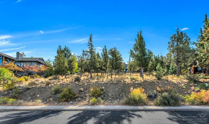 Breathtaking setting on Awbrey Butte's prestigious Panorama Drive, ready for your dream home! This lot is ready-to-build, with utilities at street and/or stubbed to lot. Stunning northwestern views from Smith Rock to the Three Sisters. Enjoy the morning sunrise with a cup of coffee as the sun rises, and wind down the day watching the sun set with your favorite beverage! Truly one of the finest remaining lots on Awbrey Butte!