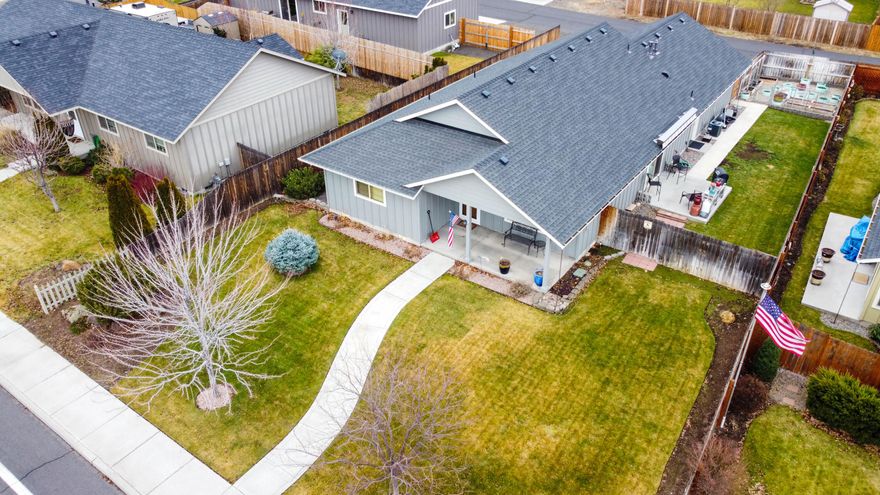 Well taken care of single-story home located in NW Redmond on a huge .21-acre lot with RV slab and parking! Home has an open floorplan with vaulted ceilings and an oversized primary bedroom with walk-in closet. The beautiful kitchen features knotty alder cabinets, stainless appliances, a breakfast bar and pantry. Continuing, the home showcases wood doors, laminate wood flooring, gas forced air heat with AC and newer exterior paint and carpet. Property is fenced, has a large concrete patio, electric patio awning, sprinkler system timers, fenced garden area and 8' x 18' covered front porch. The 24' x 24' oversized garage also features a 16' x 7' garage door. Fantastic NW Redmond location close to schools, shopping and medical. Not a drive-by – must see inside this home!