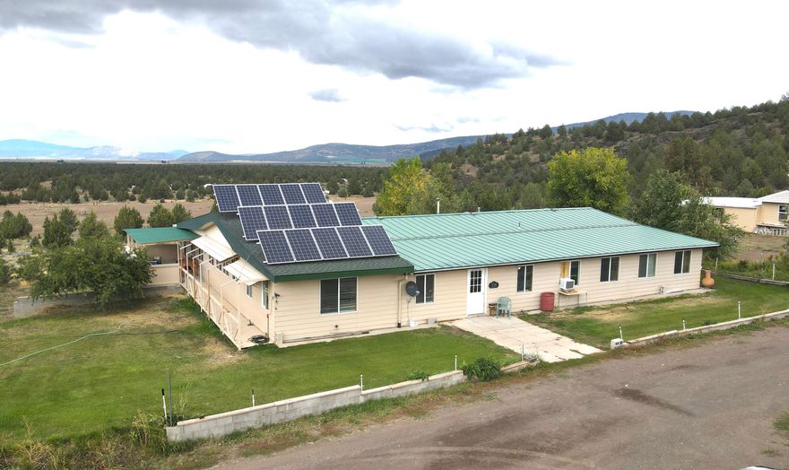 Escape to 70 private acres in Macdoel with breathtaking views and endless potential. This off-grid manufactured home is equipped for sustainable living with three wells, alternative power, and a durable metal roof for peace of mind. The fenced property offers wide open space for gardening, animals, or recreation, all while enjoying unmatched privacy and natural beauty. Features 2 horse stalls, chicken coop, separate manufactured home and fruit trees. Whether you're seeking a self-sufficient lifestyle, a peaceful retreat, or a place to build your vision, this unique property provides the perfect balance of seclusion and opportunity.