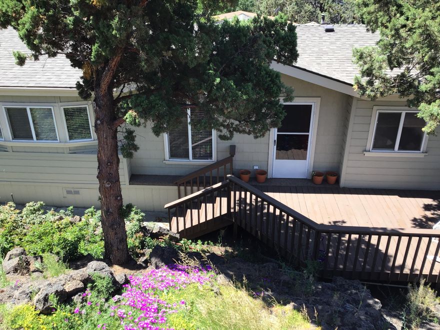 Looking for the Perfect home? Enjoy the Carefree Living this 55 plus Cascade Village 5 Star Community has to offer. Superior large lot located on Cul-De-Sac. Amenities include; Monthly Potlucks, Billiards, Bunco, Bingo, Pool, Dog Park, Fitness Center, Library.  All at your back door!  Open spaces for entertaining on your 1249 Sq Ft large wrap around deck with Cascade Mt Views. Open Kitchen with Plenty of storage. Spacious Living room w/Vaulted ceiling 1512 SF of living space. 3 Bedroom 2 full baths. Master has soaking tub. Non Smoker home. Fresh interior custom paint. Very private Low maintenance yard. Minutes away from shopping & Restaurants. Mt Bachelor Ski Resort 30 minutes. Deschutes River & Drake Park.  Your $636.00 monthly rent includes Clubhouse, Pool, street snow removal.  Management maintains all common areas. No Cost irrigation. Low  private Avion water billed every 6 months.  Great alternative to renting. Boyd Acres Neighborhood.  Flowers are in Full Bloom!!