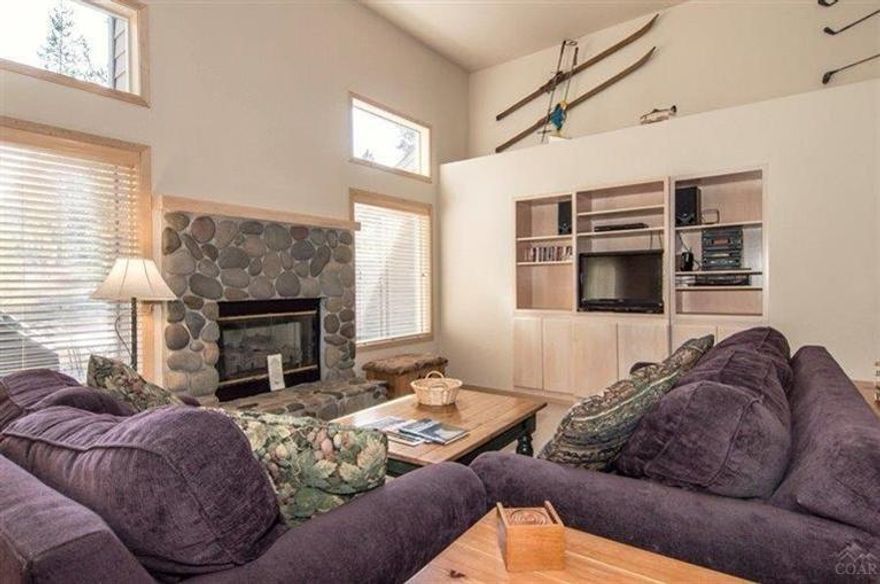 Hard to find single level living with two Master Suites. This easy to live in home has a newly updated kitchen w/stainless appliance package, new countertops, tilework & refinished cabinets. There is also fresh paint inside and out, high ceilings, Raja slate floors, a newer roof, and furnace with AC. Out back, there is a comfortable deck and hot tub that overlook a very large common area. Centrally located, #1 Tan Oak has easy access to The Village, SHARC, Mavericks, The Marketplace and Cottonwood Road.