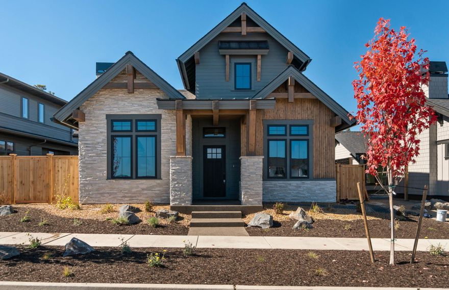 Fabulous new Curtis Home in Discovery West. This 2396 sqft home has a beautiful open floor plan that is light and bright. Featuring custom cabinets, soft close drawers, island kitchen, stainless steel appliance package including refrigerator, quartz counter tops throughout,  primary bedroom on the main floor along with another 1st floor en suite bedroom, and a spacious office.  Upstairs you'll find a loft and a bedroom with full bath. Enjoy the courtyard that can be accessed from the great room or the primary bedroom. Including a large tandem 3-car garage, all built to Earth Advantage energy standards.