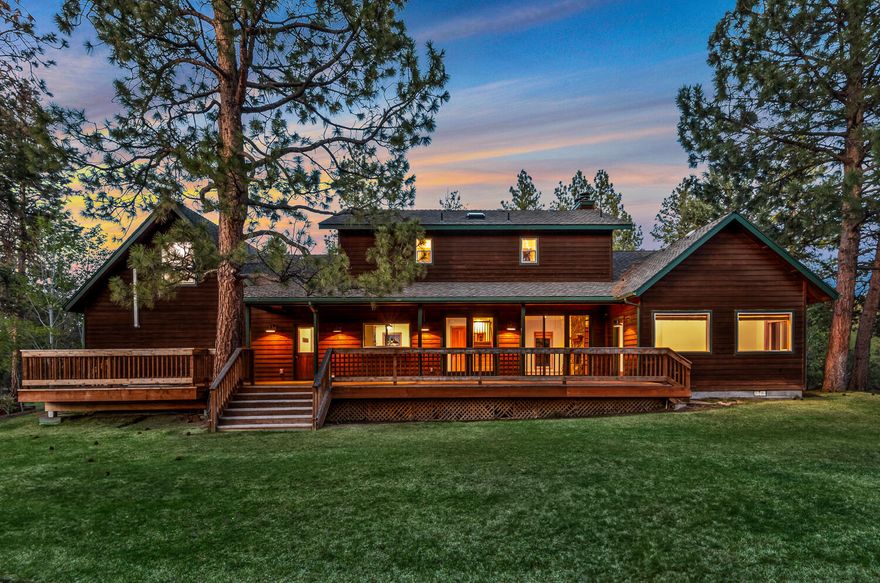 Rare opportunity to live on 9.4 acres, while still having the Saddleback neighborhood setting & Summit School District.  Over $350k+ of updates in the last few years highlighted by true hardwood tongue & groove maple floors, aluminum clad sliding doors to the back deck, new kitchen cabinets, solid surface counters & appliances, new primary suite bathroom & much more.   The two sided river rock fireplace anchors the great room that has windows on both sides of the room and doors leading to the deck. Primary suite beams with natural light, complete with a vaulted ceiling & river rock fireplace. The south facing flex space is ideal for a home office or exercise room, or both. Upstairs are two generous sized bedrooms & a shared bath.  Completing the floor plan is a separate apartment/guest suite above the two car garage.  Outside is your own oasis with an expansive south facing deck, a lovely lawn, two stall barn & 9+ acres of privacy.  All this & located less than a mile to Shevlin Park!