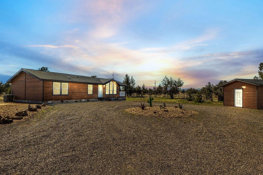 Don't miss this great horse property in Crooked River Ranch w/views of the Cascades & Mount Jefferson! Custom Prefab Home features 3 bed, two baths on a whopping 6.2 acres!  Open floorplan w/vaulted ceiling features a spacious living area w/tons of natural light through the massive windows w/property views. Kitchen offers tons of cabinet space, prep areas, wrap around breakfast bar seating, large stainless steel sink & corner pantry. All appliances included. Eating area w/sliding door to deck. Well sized primary bedroom w/bath features a dbl vanity & step-in shower. Two addt'l bedrooms share a full bath w/shower+tub combo. Full laundry room w/storage, washer & dryer included. Plenty of space outside for your RV, toys, pets & more! Low maintenance landscaping, gated & cross fenced for all your critters, new well + septic & power was moved underground for non-obstructed views. Short distance from CRR resort amenities; swimming pool, tennis/pickleball courts, 18-hole golf course + MORE!