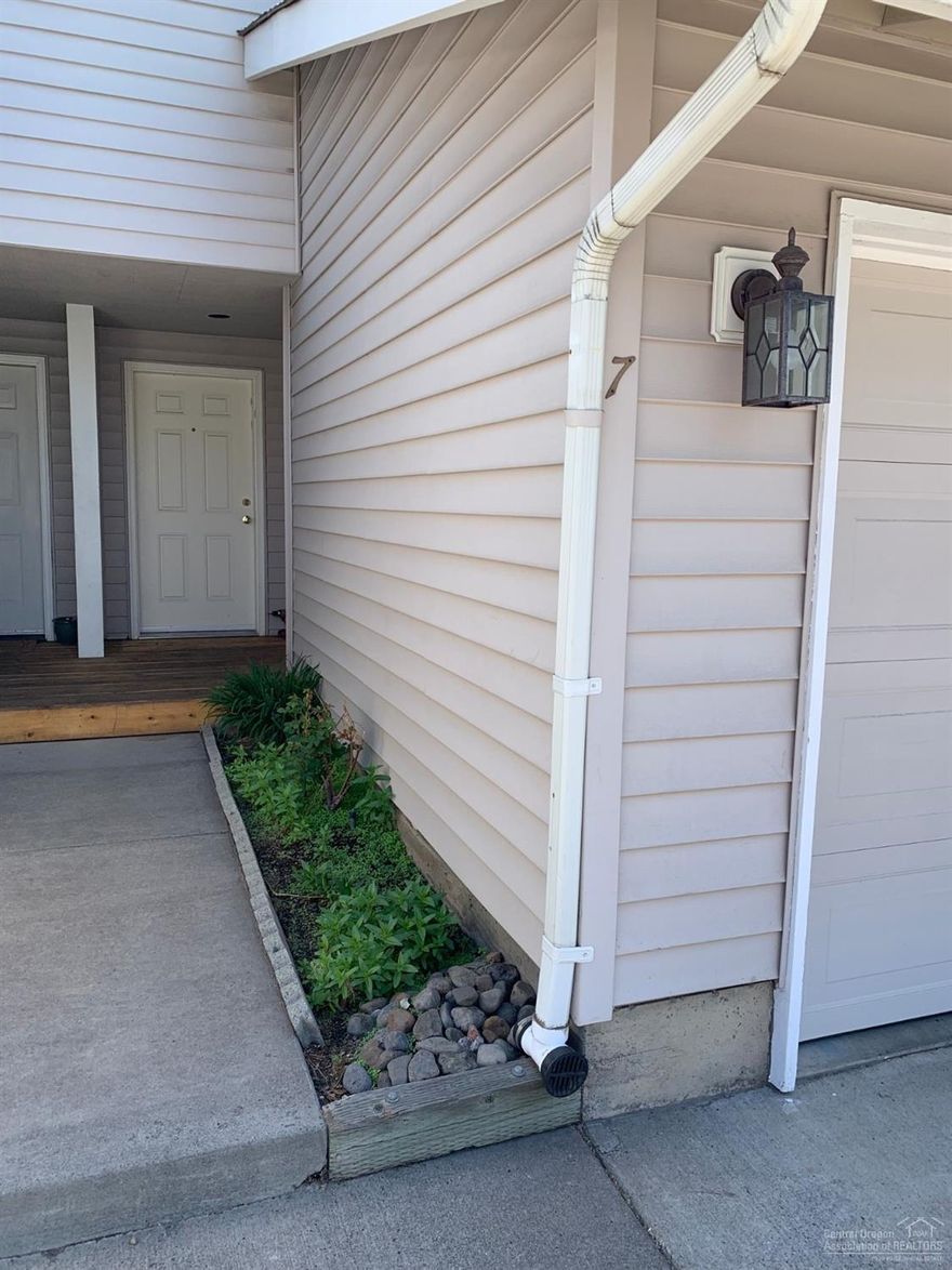 Amazing East side condo. TWO master suites! Walk in closets. Both suites up, common areas and a half bath down. Beautifully updated kitchen with maple cabinets, stainless appliances, granite, and tile. 2 patios (1 up and 1 down), double garage that includes storage and a built in work bench. Wonderful investment property that is close to everything Bend has to offer.