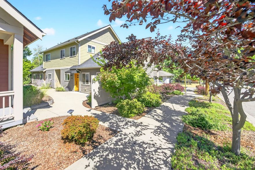 Single level end unit within the quaint Condominium Cottages of Garfield complex. Energy efficient, quality built in 2007. This one-bedroom condo has an additional office/ versatile room w/ double door.  Well thought open floor plan of approx. 900 SF. Kitchen has granite countertops, maple cabinetry and stainless-steel appliances. Thick exterior walls w/ 9' ceiling, skylights, and natural light from the many windows create an airy and comfortable feel within a small footprint. Solid fir doors and trim to compliment the wood flooring throughout the main living areas. Nice covered front porch to greet your guests or relax w/ a cup of coffee. HOA fees cover the exterior maintenance of the buildings and common areas. Great central location in the heart of Ashland with close proximity to parks, SOU, coffee shops, restaurants and city services. Either full time living, or, looking for your ''pied de terre'' this could be a great option!