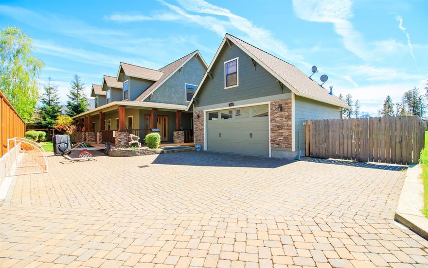 This beautiful custom home is located in the Echoes of the Ponderosa, and across the street from a city park. As you enter into the open, spacious living area, you can't help but notice the pasture land through the large windows. You won't believe you are still in a subdivision! The roomy kitchen is open to the living area and has a large pantry. The huge master suite is located on the main floor and has a romantic fireplace, & private deck access with more of those incredible views. The master bath has a jetted tub, separate shower, heated floors, and huge walk-in closet. Upstairs you'll find 3 gigantic bedrooms with walk-in closets. The garage has bonus room upstairs that can easily serve as an additional living space. There are so many upgrades in this home; from the built-in surround sound to the light up pavers in the cobblestone driveway! This home is a must tour!