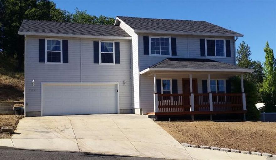 This is a wonderful 3 bedroom, 2 1/2 bath home sitting atop a great cul-de-sac in Eagle Point. Home features tile counters in kitchen, tile entry, gas fire place in living room, huge master bedroom with an equally huge walk-in closet. Master bath has a very large soaking tub, separate shower, double sinks and tile floors! Great mountain views from upstairs and enjoy the covered back patio that backs up to wooded hillside. New HVAC system and RV parking. A lot of home!