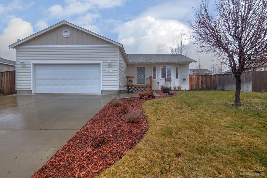 Move in ready home in desirable NW Redmond! Just blocks away from schools & parks, this home is ready to go. Open floor plan w/Cascade Mtn views from the great room & entry. Gas fireplace, spacious bedrooms & huge Master Suite. Kitchen w/bar seating opens to dining area & looks out to back yard. Covered back patio & front porch for entertaining, A/C for hot summer days! Through the huge laundry room is the oversized garage w/builtin shelving, shop area & work bench. Pet fenced & landscaped w/sprinklers.