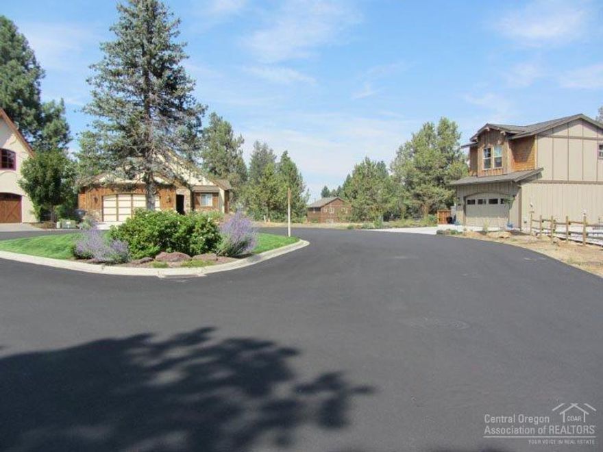 Unique home site in a neighborhood with privacy allowed by surrounding common area invites you outdoors. A life style awaits you with this Fabulous home site with common area creek on one side & common area towards the back of the home site. Located in a 6 acre subdivision with walking paths, ponds, waterfalls, amphitheater. End of the cul-de-sac located in SE Bend in forest Creek. This was originally the Shire Subdivision.