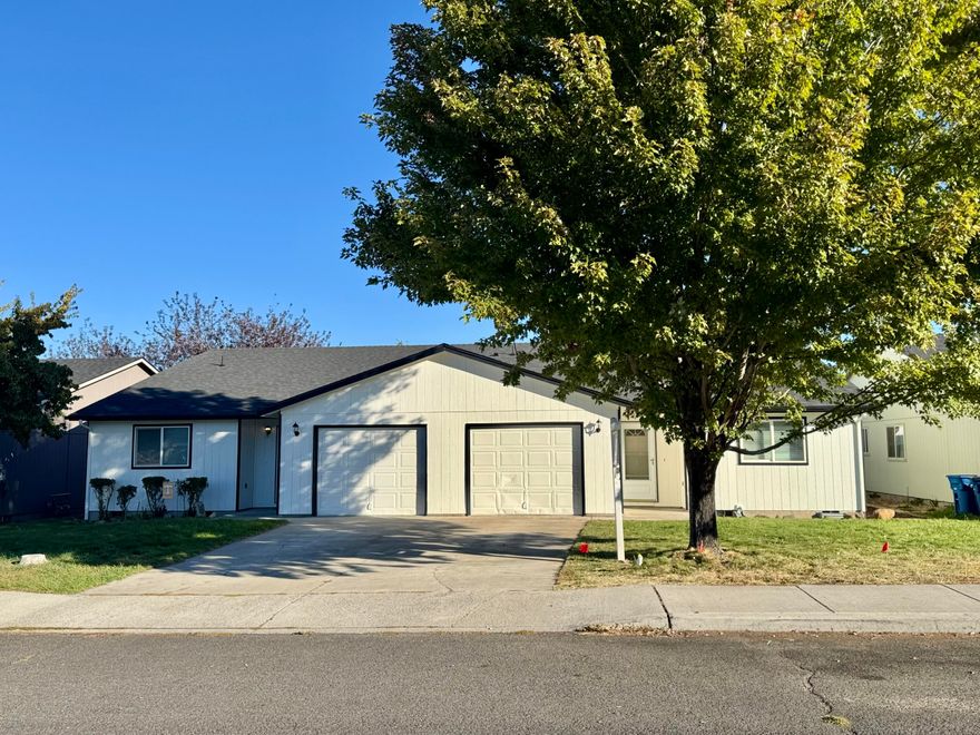 Excellent owner or investor opportunity! This well-maintained duplex offers strong rental potential and flexibility. Recent updates include a brand-new roof (installed in August 2025) and a freshly painted interior in Unit 611, where the carpet shows like new. Unit 611 is currently vacant—perfect for owner-occupancy or placing a new tenant. Plus Property Management estimates rent at $2,150 per month. Each single-level unit features three bedrooms, two full bathrooms, and an attached single-car garage. Situated on a level, easy-care lot, approximately. One mile off Highway 97, this property is conveniently located near shopping and dining, and is just minutes from the Redmond Airport. A fantastic opportunity for steady rental income or multi-generational living—don't miss this versatile investment!