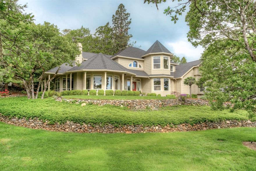 Captivating,custom Pagnini built home in Coachman Hills with outstanding views & beautiful grounds. Built in 1999, this serene beauty offers flowing floor plan with main floor family rm, living rm, office, formal dining, & spacious kitchen w/island & delightful, windowed informal dining. Enjoy beautiful cabinetry & built-ins; hardwood flooring; 2 fp; unique ceilings, moldings & angles; granite counters; gas cooking, heating & hot water; central vac; surround sound. All bedrooms are upstairs including spacious master suite w/luxurious bath & seating area showcasing breathtaking views. 2 car attached garage has a shop area &lots of storage. Outside is spectacular 4 Season cedar, heated & air-conditioned Bonus Room w/electric fireplace, pool table with ping pong & card table tops as well. This additional space has many uses including extra living, guests, kid haven, hobbies, etc. You'll enjoy the backyard waterfall, screened 10x14 patio room & more all in award winning JACKSONVILLE!!